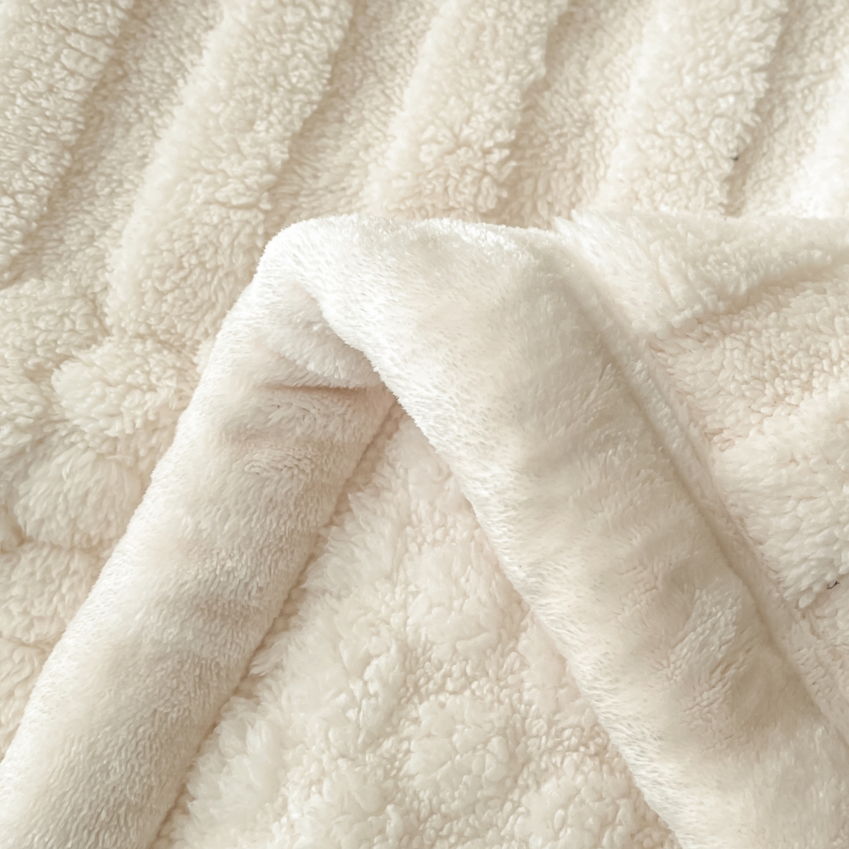 91家纺网 家纺一手货源 找家纺 （总）欧邦 2025新款A类提花云锦绒双面绒单层毯-风铃系列