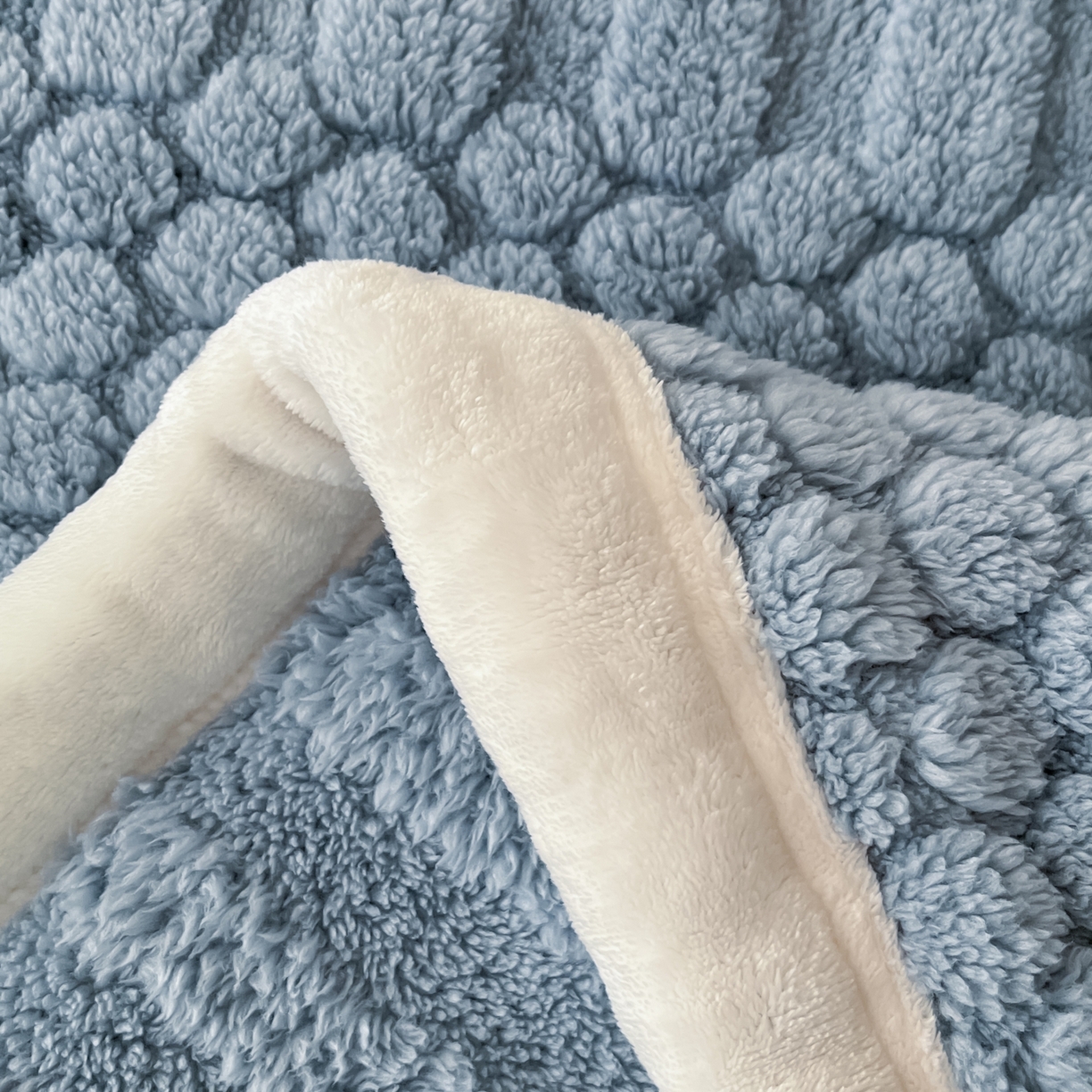 91家纺网 家纺一手货源 找家纺 欧邦 2025新款A类提花云锦绒双面绒单层毯-风铃系列 风铃-蓝