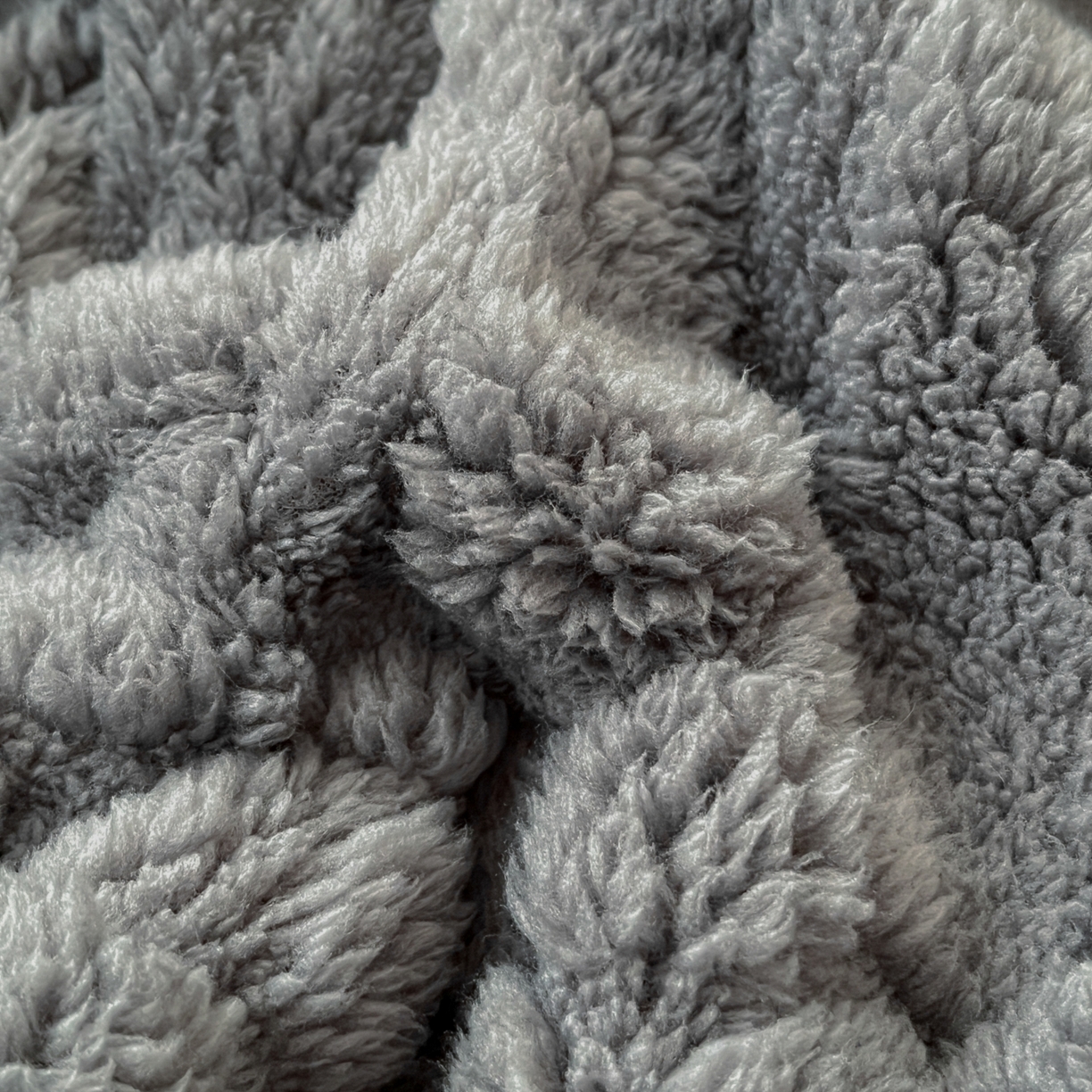 91家纺网 家纺一手货源 找家纺 欧邦 2025新款A类提花云锦绒双面绒单层毯-风铃系列 风铃-深灰