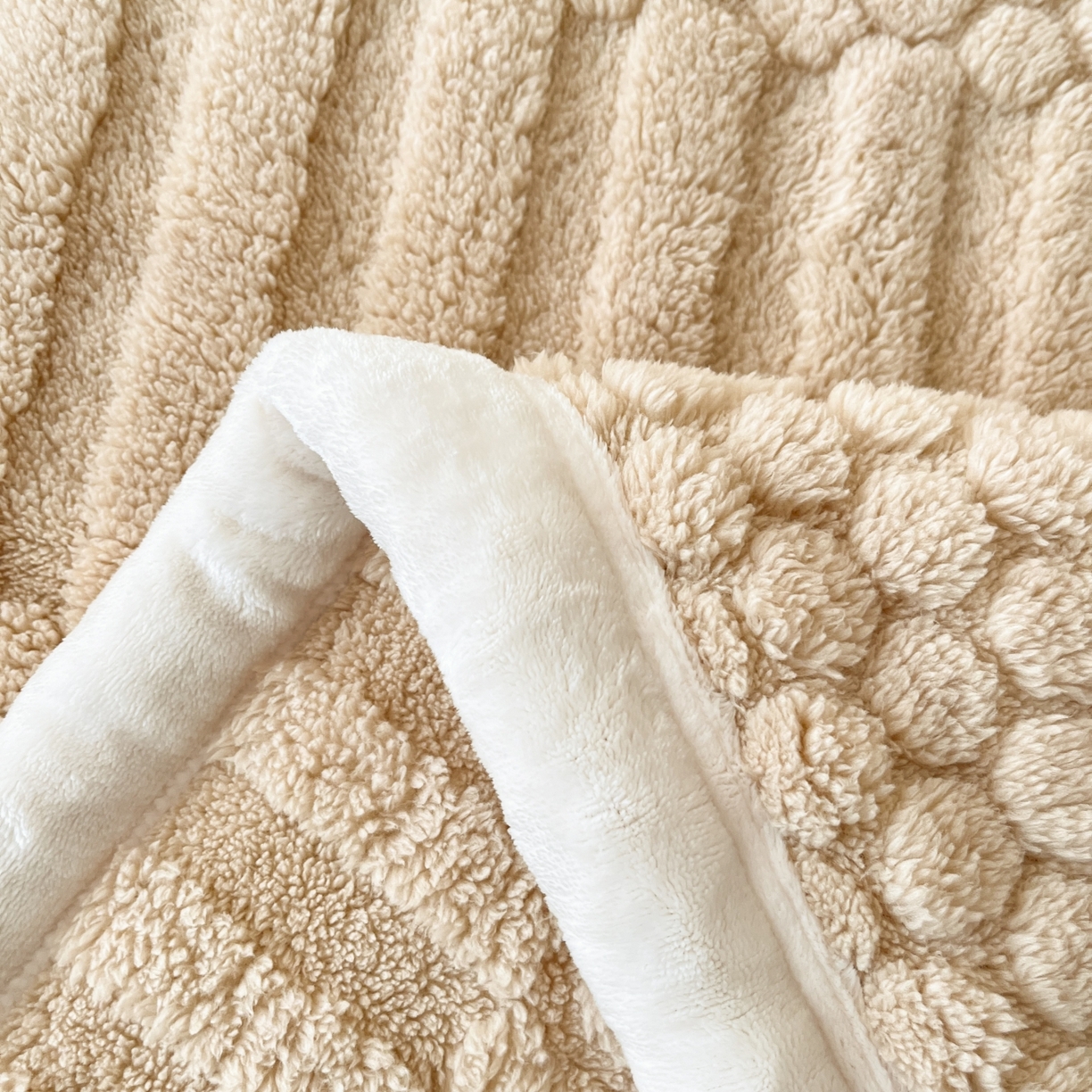 91家纺网 家纺一手货源 找家纺 欧邦 2025新款A类提花云锦绒双面绒单层毯-风铃系列 风铃-驼