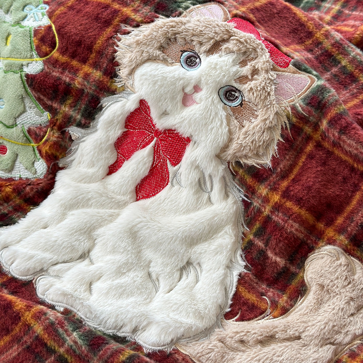 91家纺网 家纺一手货源 找家纺 柚子YOUTH 2025新款牛奶绒羊绒多功能毯毯子 红格猫