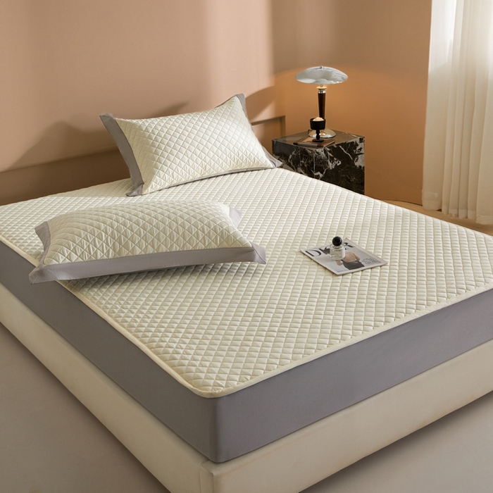 91家纺网 家纺一手货源 找家纺 由有家居 2025新品60S全棉长绒棉绗缝夹棉大豆纤维床垫床褥平铺款床笠款三件套 床笠-奶油米