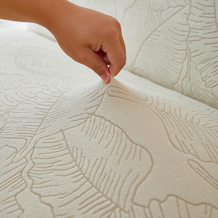 91家纺网 家纺一手货源 找家纺 逐日沙发套 2025新款提花裙摆沙发床套 裙摆沙发床套 叶沙-米白