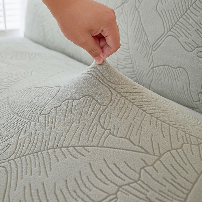 91家纺网 家纺一手货源 找家纺 逐日沙发套 2025新款提花裙摆沙发床套 裙摆沙发床套 叶沙-浅灰