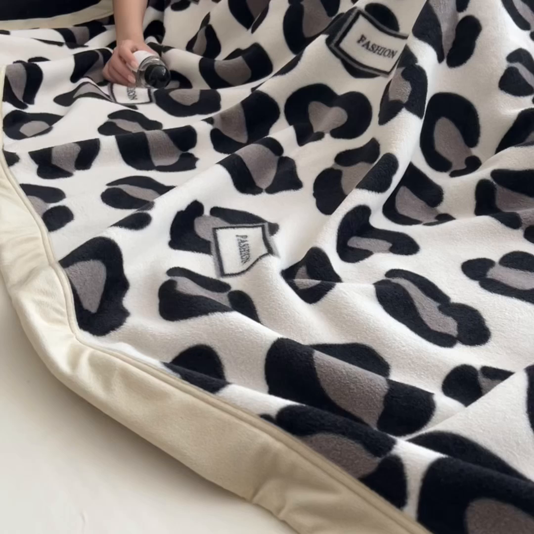 91家纺网 家纺一手货源 找家纺 丝幔家纺 2025新款羊绵绒双层印花毛毯毯子 豹纹星尘