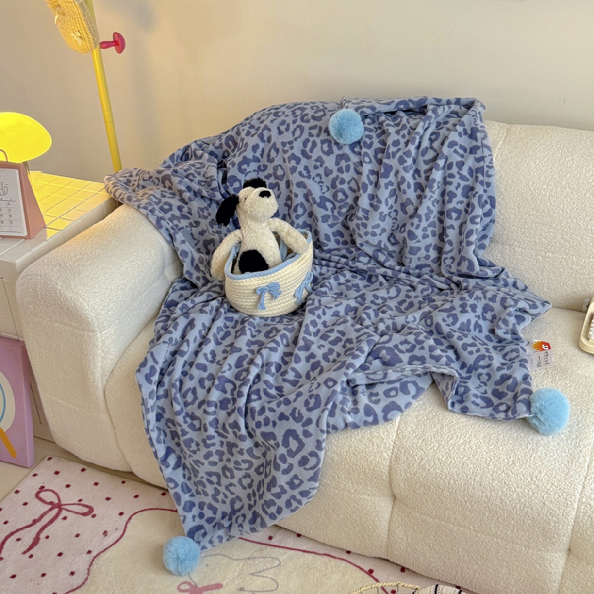 91家纺网 家纺一手货源 找家纺 希诺家居 2025新款牛奶绒豹纹毛球毯子居家博主甜咖风格球球毛毯 毛毯 豹纹-蓝