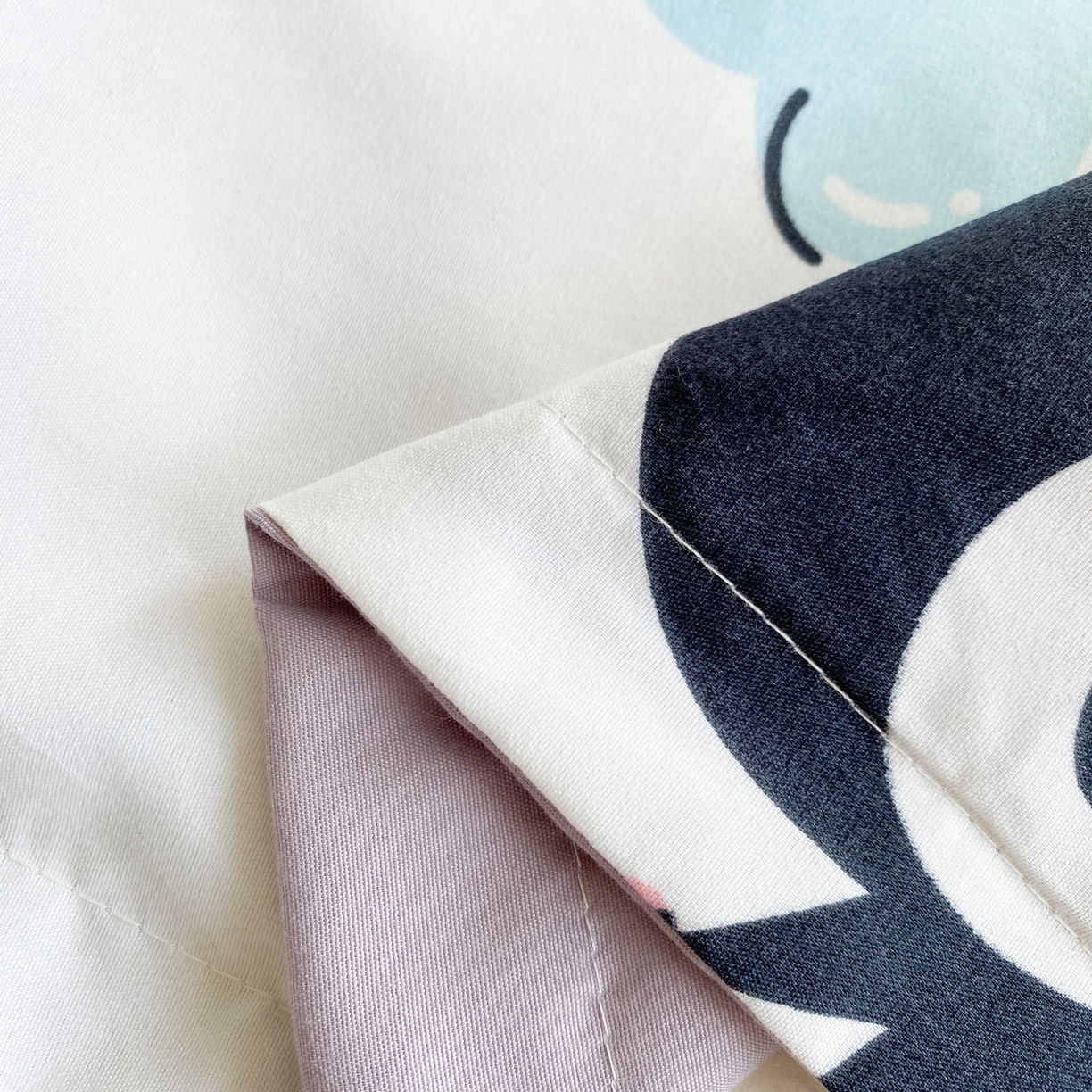 91家纺网 家纺一手货源 找家纺 一电 2025新款卡通A类水洗棉麻单人单层枕头套亲肤双人枕套 波点库洛米