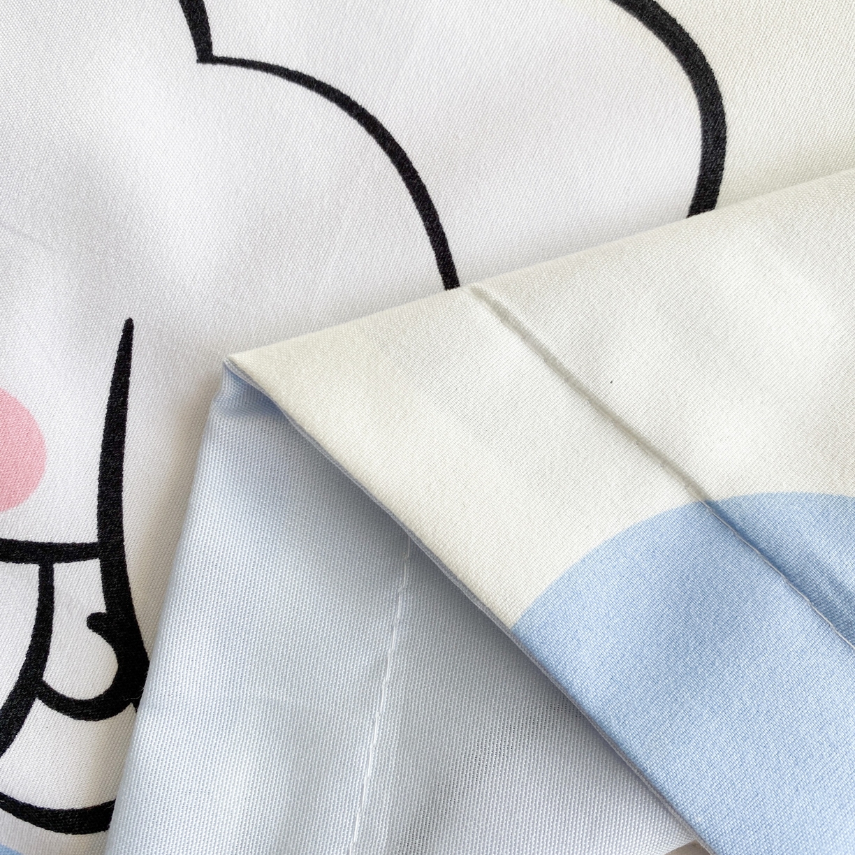 91家纺网 家纺一手货源 找家纺 一电 2025新款卡通A类水洗棉麻单人单层枕头套亲肤双人枕套 圈圈玉桂狗