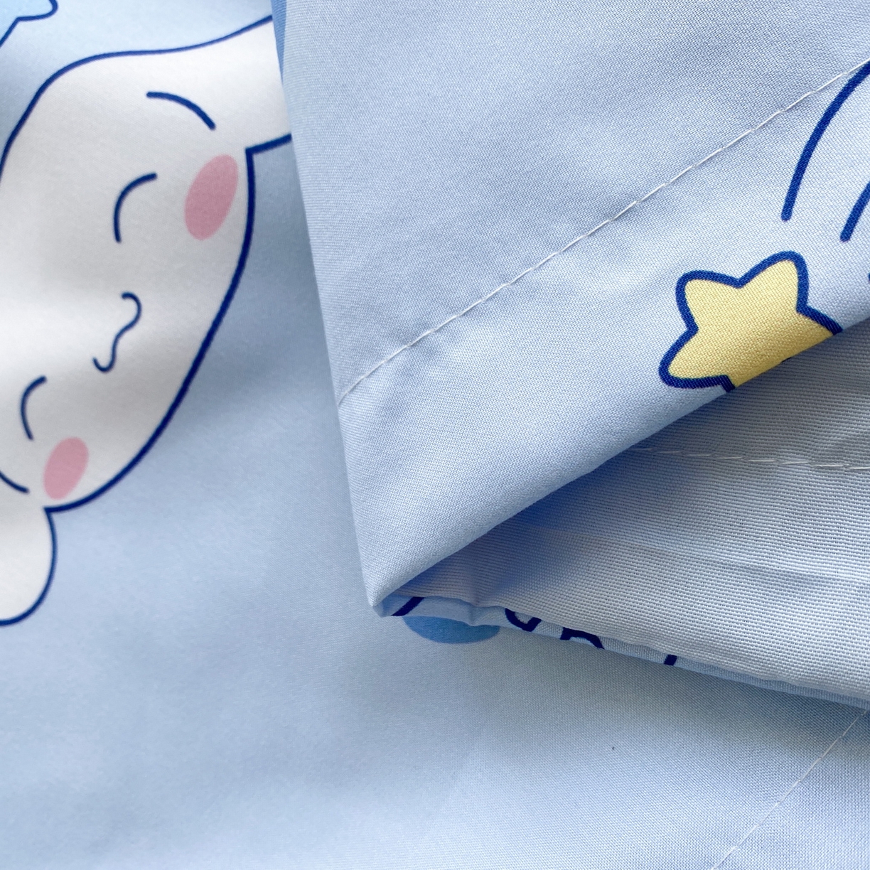 91家纺网 家纺一手货源 找家纺 一电 2025新款卡通A类水洗棉麻单人单层枕头套亲肤双人枕套 星空玉桂狗