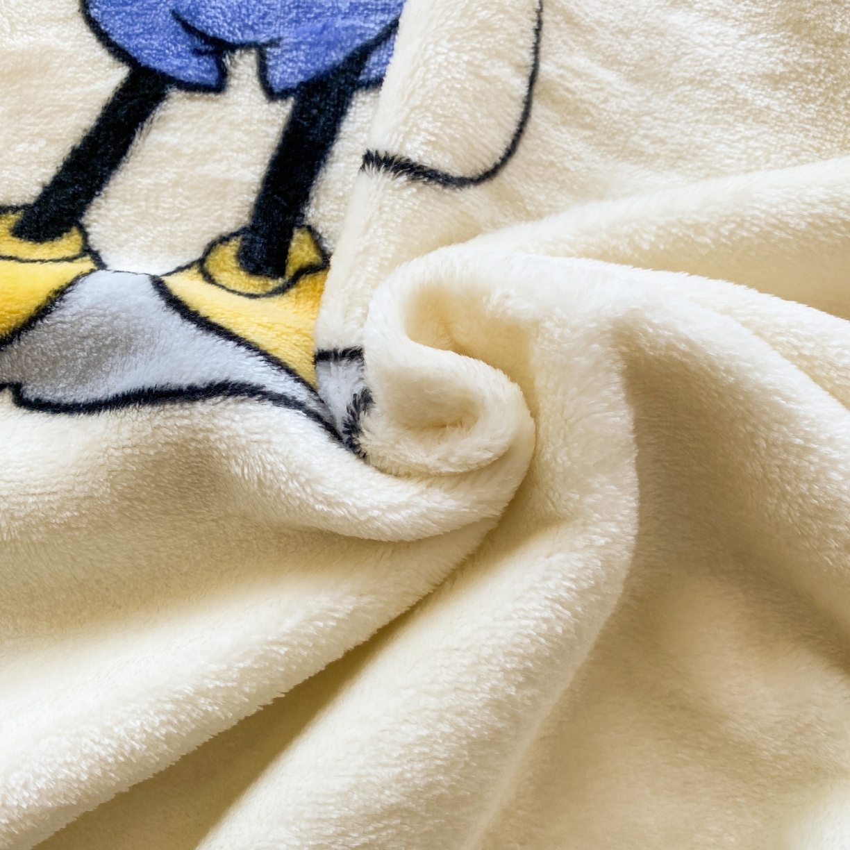 91家纺网 家纺一手货源 找家纺 一电 2025新款卡通高克重双面法莱绒毛毯四季盖毯 奇妮斗舞