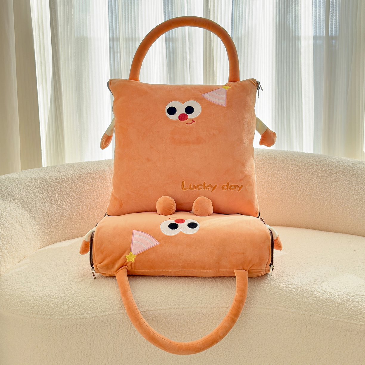 91家纺网 家纺一手货源 找家纺 诺可 2025新款牛奶绒刺绣幸运日手提式多功能抱枕被 幸运日-橙