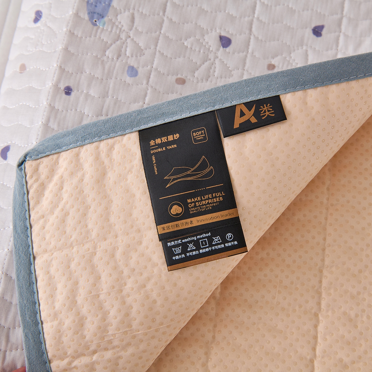 91家纺网 家纺一手货源 找家纺 拾小柒 2025年新款全棉双层纱隔脏姨妈垫护理垫床护垫 鲤安-防水款