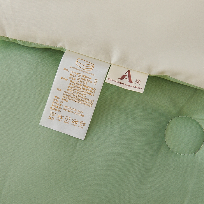 91家纺网 家纺一手货源 找家纺 被多多被业 2025新款A类亲肤水洗棉羽丝棉被-熊猫系列 熊猫-奶昔白拼草绿