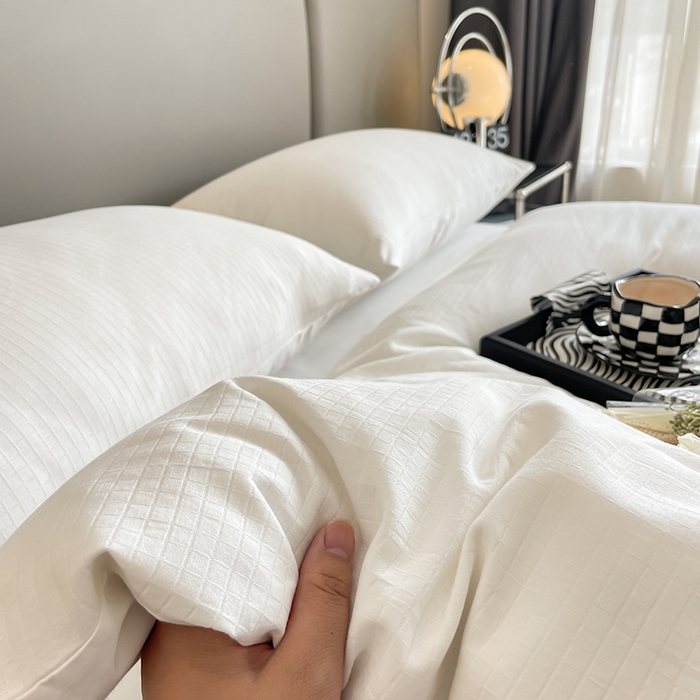 91家纺网 家纺一手货源 找家纺 琪格格纺织 2025新款纯棉轻奢大提花酒店名宿风家纺四件套 原棉小提花本白