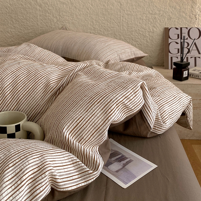 91家纺网 家纺一手货源 找家纺 琪格格纺织 2025新款纯棉华夫格极简宅寂风四件套 速写 提花棕条