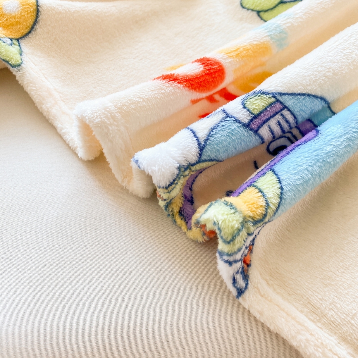 91家纺网 家纺一手货源 找家纺 （总）一电 2025新款卡通高克重双面法莱绒毛毯四季盖毯