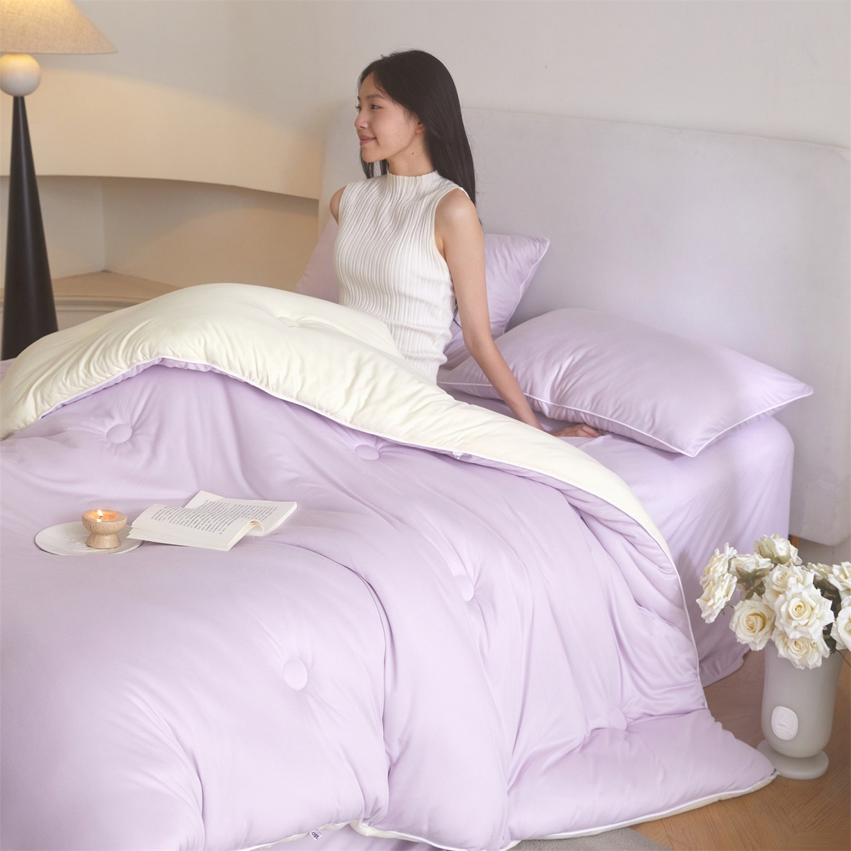 91家纺网 家纺一手货源 找家纺 头等舱 2025新款针织A类软糯净植力抗菌防螨防霉低致敏双拼秋冬被（模特图） 浅紫+奶黄