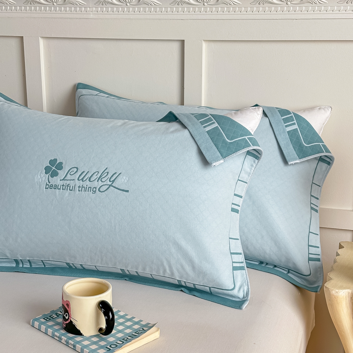 91家纺网 家纺一手货源 找家纺 沐瑟家纺 2025新款馨梦枕巾 四叶草-湖蓝 52x75cm枕巾一对