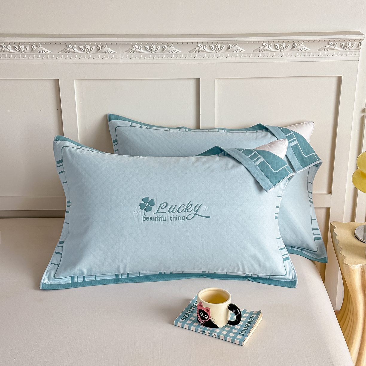 91家纺网 家纺一手货源 找家纺 沐瑟家纺 2025新款馨梦枕巾 四叶草-湖蓝 52x75cm枕巾一对