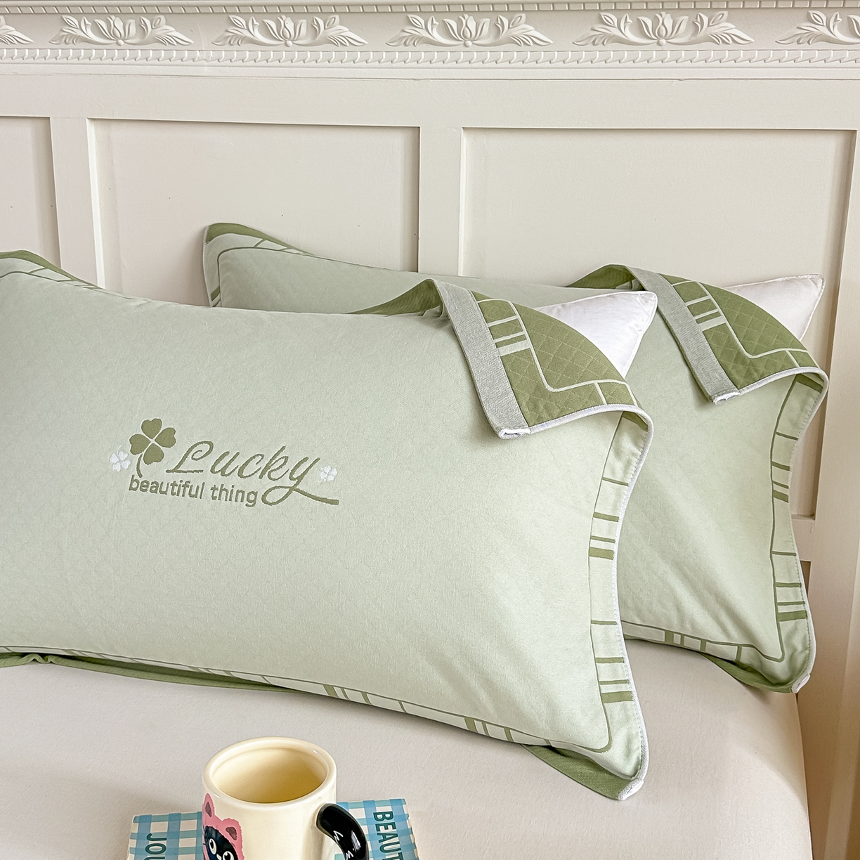 91家纺网 家纺一手货源 找家纺 沐瑟家纺 2025新款馨梦枕巾 四叶草-绿 52x75cm枕巾一对