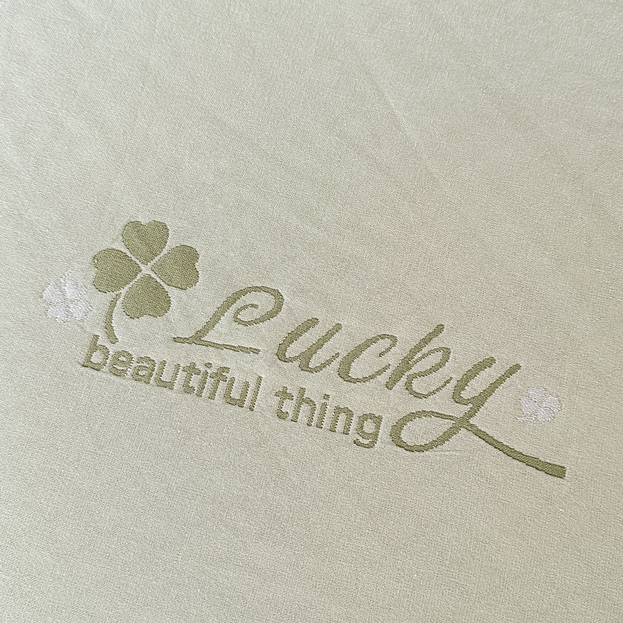 91家纺网 家纺一手货源 找家纺 沐瑟家纺 2025新款馨梦枕巾 四叶草-绿 52x75cm枕巾一对