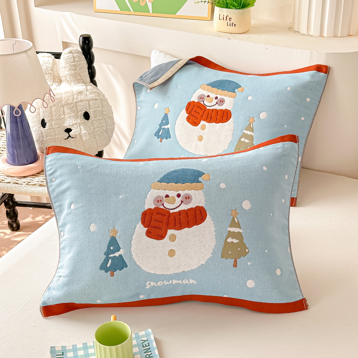 91家纺网 家纺一手货源 找家纺 沐瑟家纺 2025新款绵柔儿童纯棉纱布儿童枕巾 小雪人