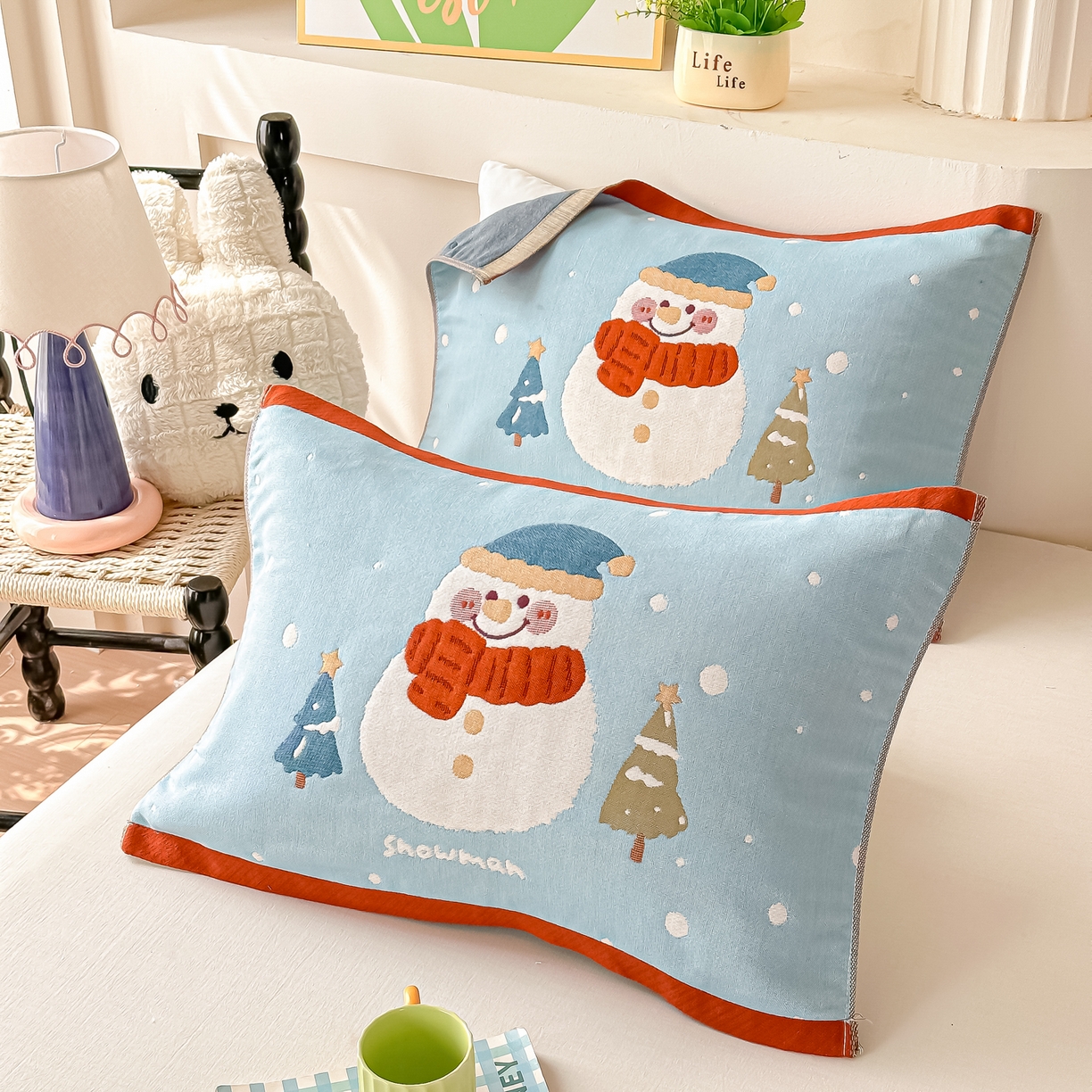 91家纺网 家纺一手货源 找家纺 沐瑟家纺 2025新款绵柔儿童纯棉纱布儿童枕巾 小雪人