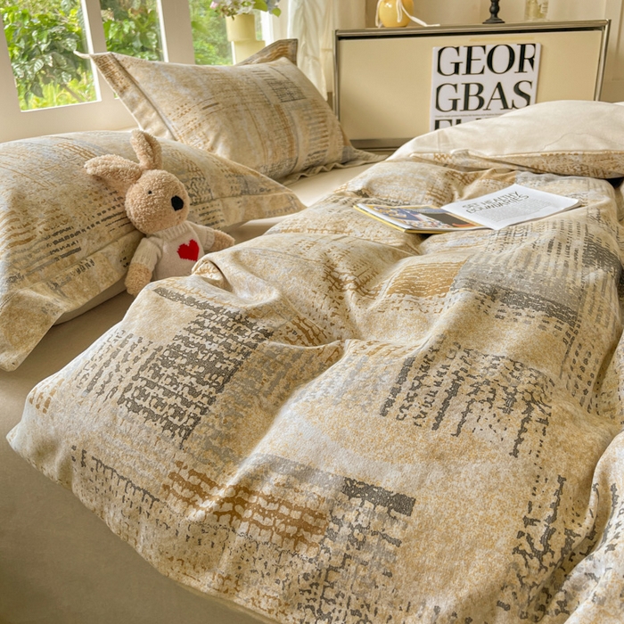 91家纺网 家纺一手货源 找家纺 仔仔熊 2025新款磨毛四件套系列 暖黄格纹