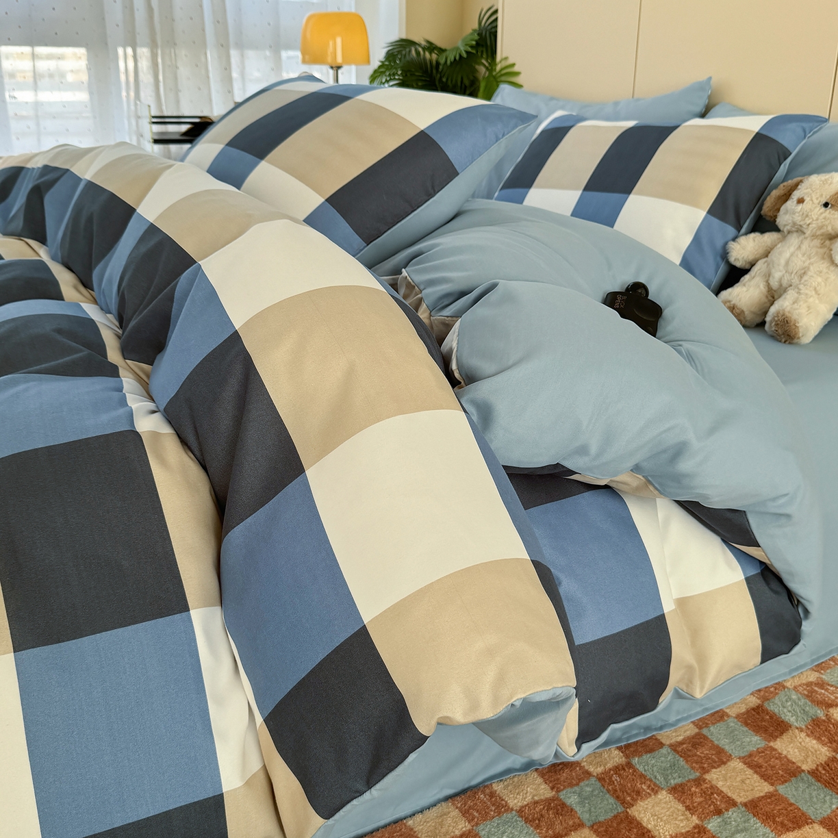 91家纺网 家纺一手货源 找家纺 十一家居 2025年秋冬新款A类亲肤云朵水洗棉无印风四件套-叙境系列 柏林蓝格+海青蓝