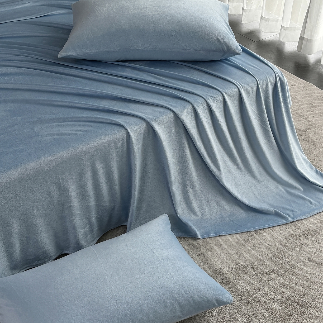 91家纺网 家纺一手货源 找家纺 馨乐家纺 2025新款简约时尚纯色水晶绒床单 浅蓝