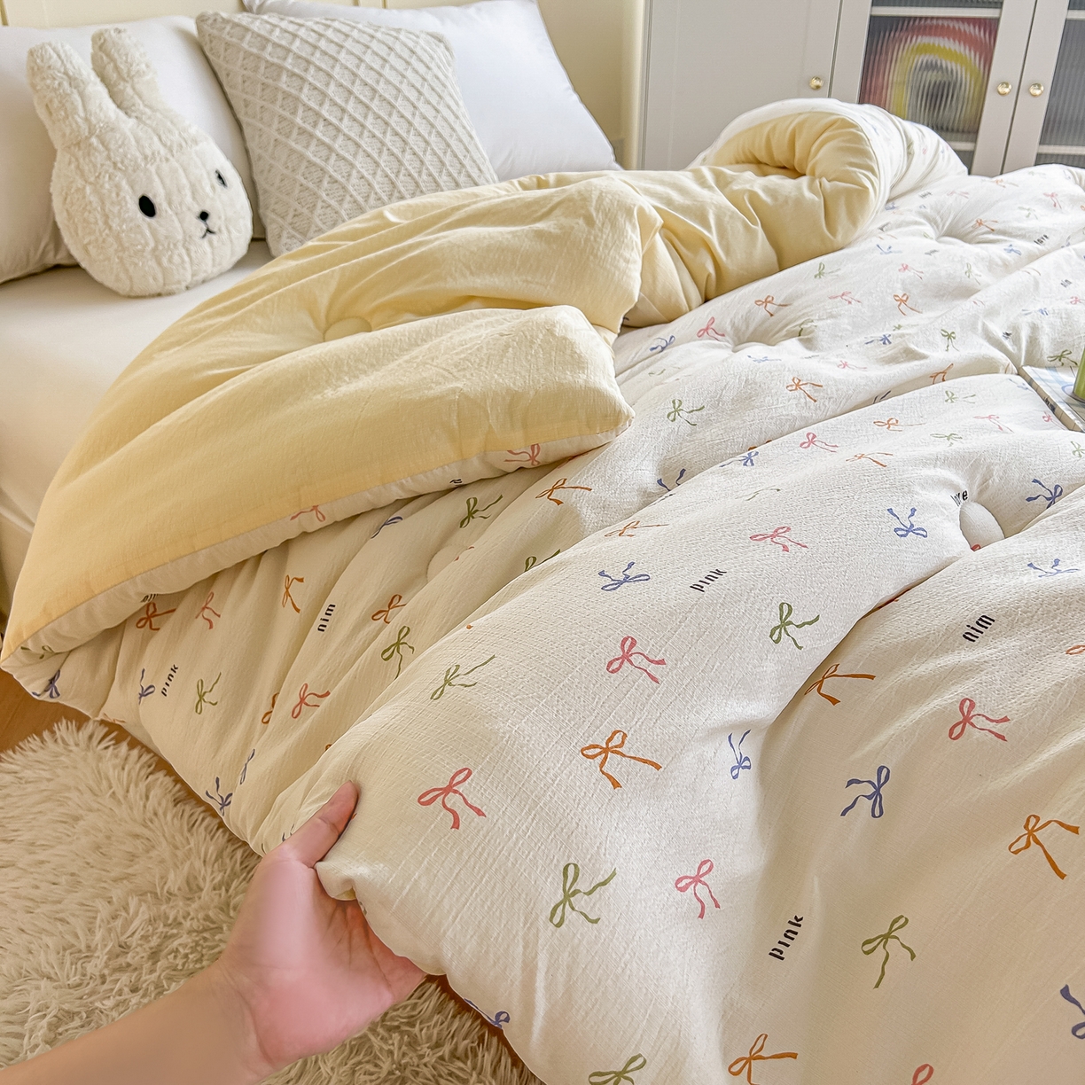 91家纺网 家纺一手货源 找家纺 佳鸿家纺 2025新款云感双层纱冬被软糯云朵棉春秋被被子加厚被芯 彩色蝴蝶结