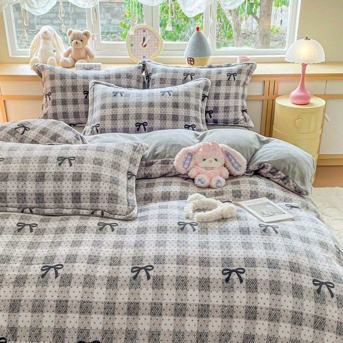 91家纺网 家纺一手货源 找家纺 典曼家纺 2025新款加厚保暖双面牛奶绒四件套 方糖蝴蝶结