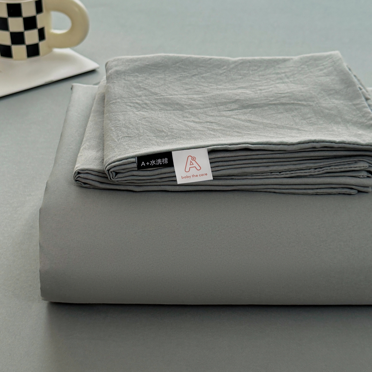 91家纺网 家纺一手货源 找家纺 十一家居 2025年新款ins风A类母婴级亲肤云朵水洗棉单床单 暖灰