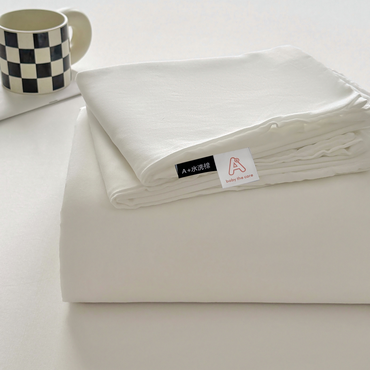 91家纺网 家纺一手货源 找家纺 十一家居 2025年新款ins风A类母婴级亲肤云朵水洗棉单床单 本白