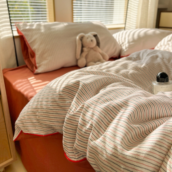 91家纺网 家纺一手货源 找家纺 宜代光年 2025新款全棉纯棉色织提花滚绳款四件套-森韵 森韵-暖橘