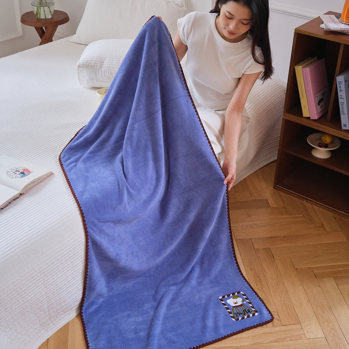 91家纺网 家纺一手货源 找家纺 沐瑟家纺 2025新款亲肤柔软珊瑚绒毛巾浴巾-呆呆熊系列 呆呆熊-蓝色 70*140cm浴巾/条