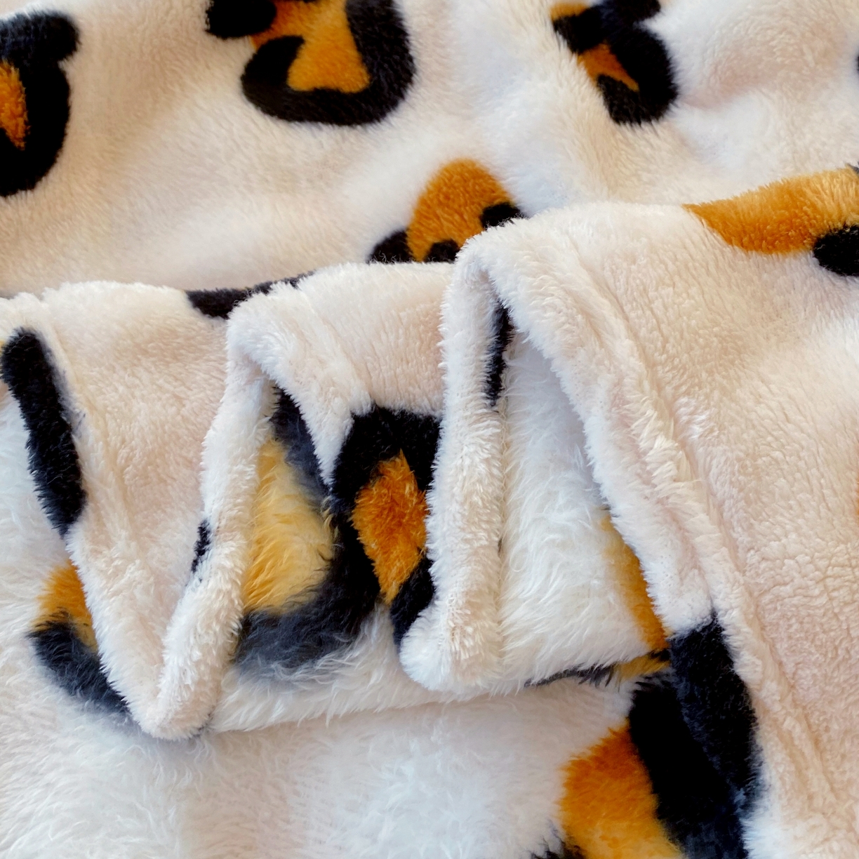 91家纺网 家纺一手货源 找家纺 yyds网供 2025新款简约印花泡泡绒毯多功能加绒盖毯沙发空调房办公午休毯毛毯毯子 托斯卡纳豹纹-泡泡绒