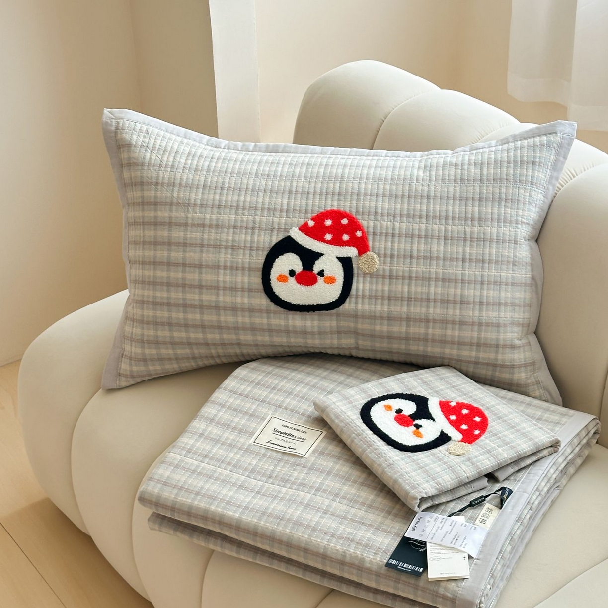 91家纺网 家纺一手货源 找家纺 觅糖家纺 2025新款色织水洗棉毛巾绣床盖四件套 小企鹅