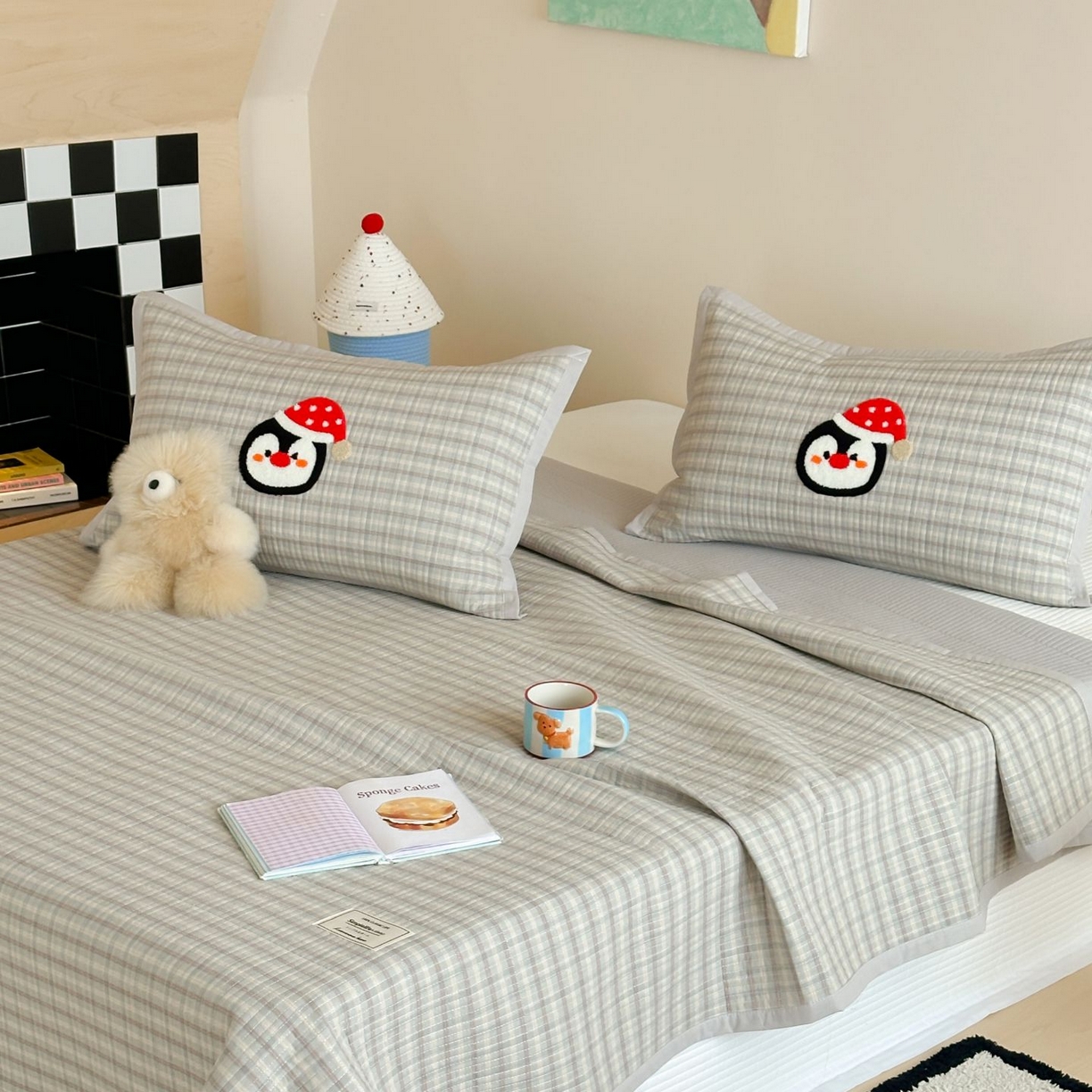 91家纺网 家纺一手货源 找家纺 觅糖家纺 2025新款色织水洗棉毛巾绣床盖四件套 小企鹅