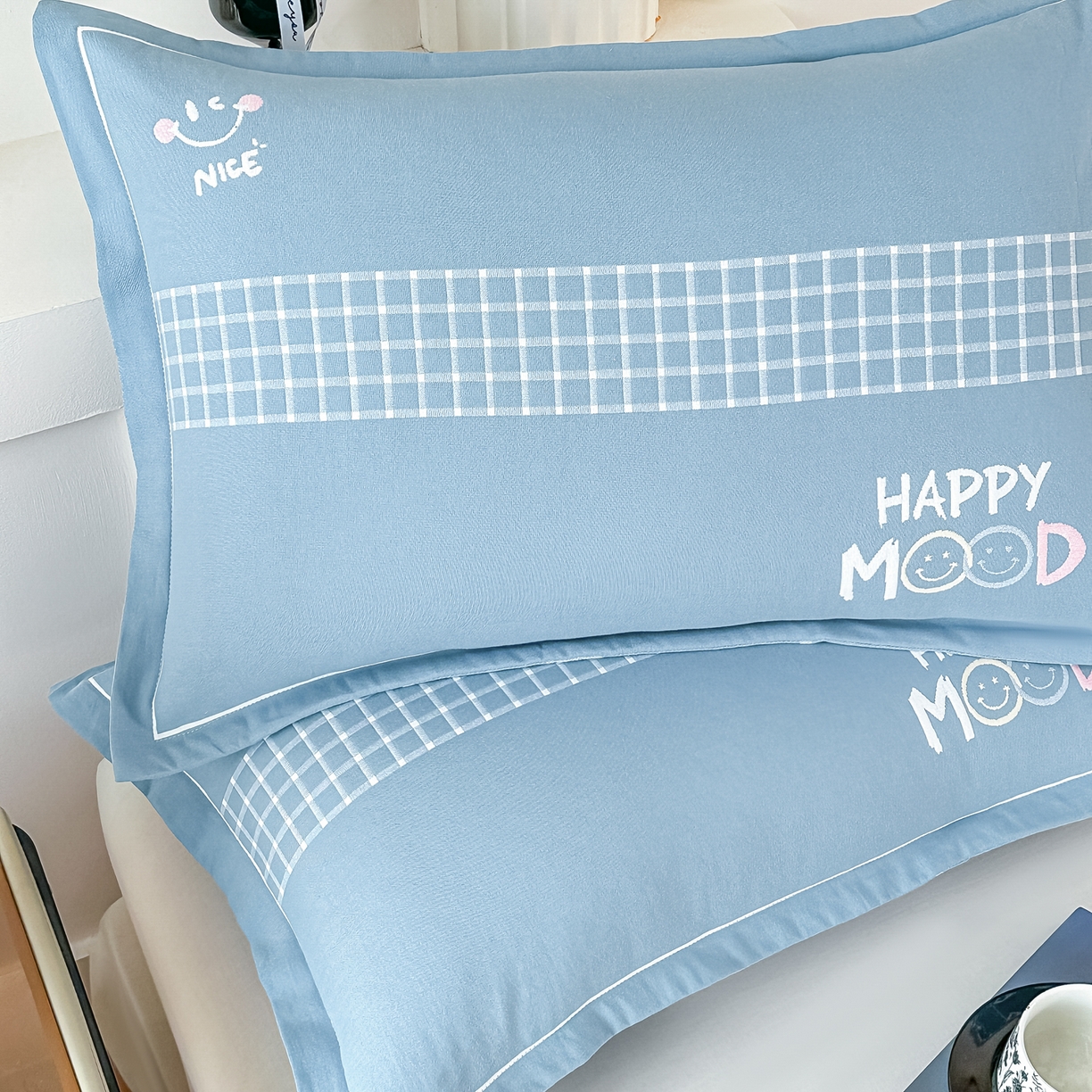 91家纺网 家纺一手货源 找家纺 沐瑟家纺 2025新款怡家枕套单品枕套枕套单件 笑脸-蓝灰色