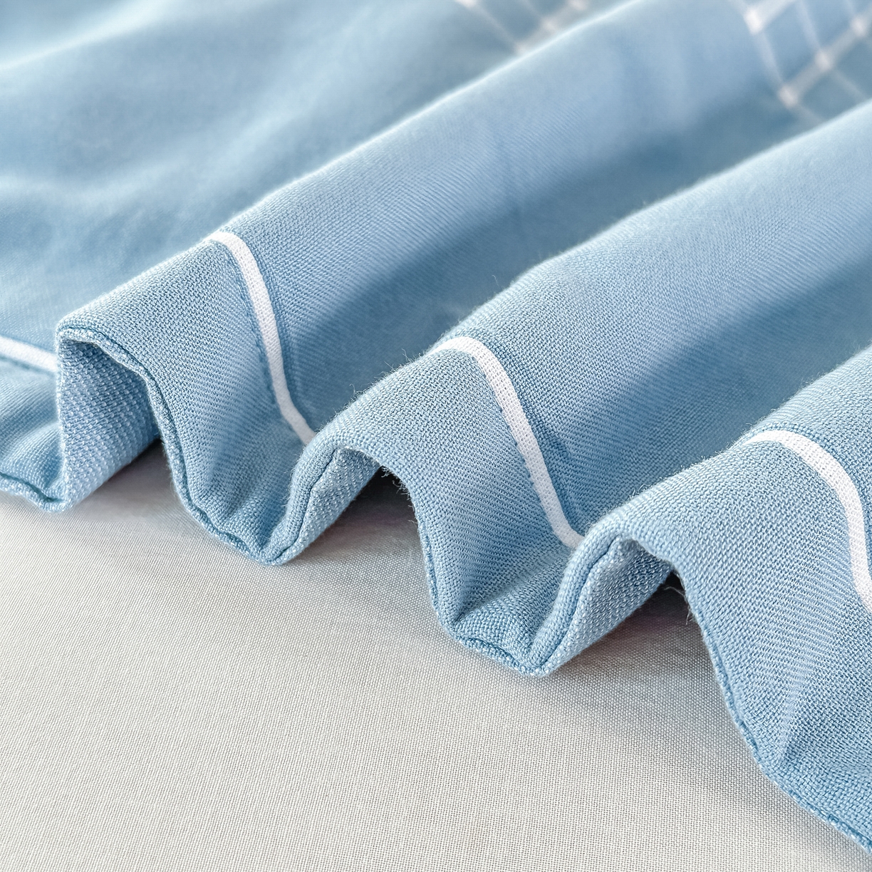 91家纺网 家纺一手货源 找家纺 沐瑟家纺 2025新款怡家枕套单品枕套枕套单件 笑脸-蓝灰色