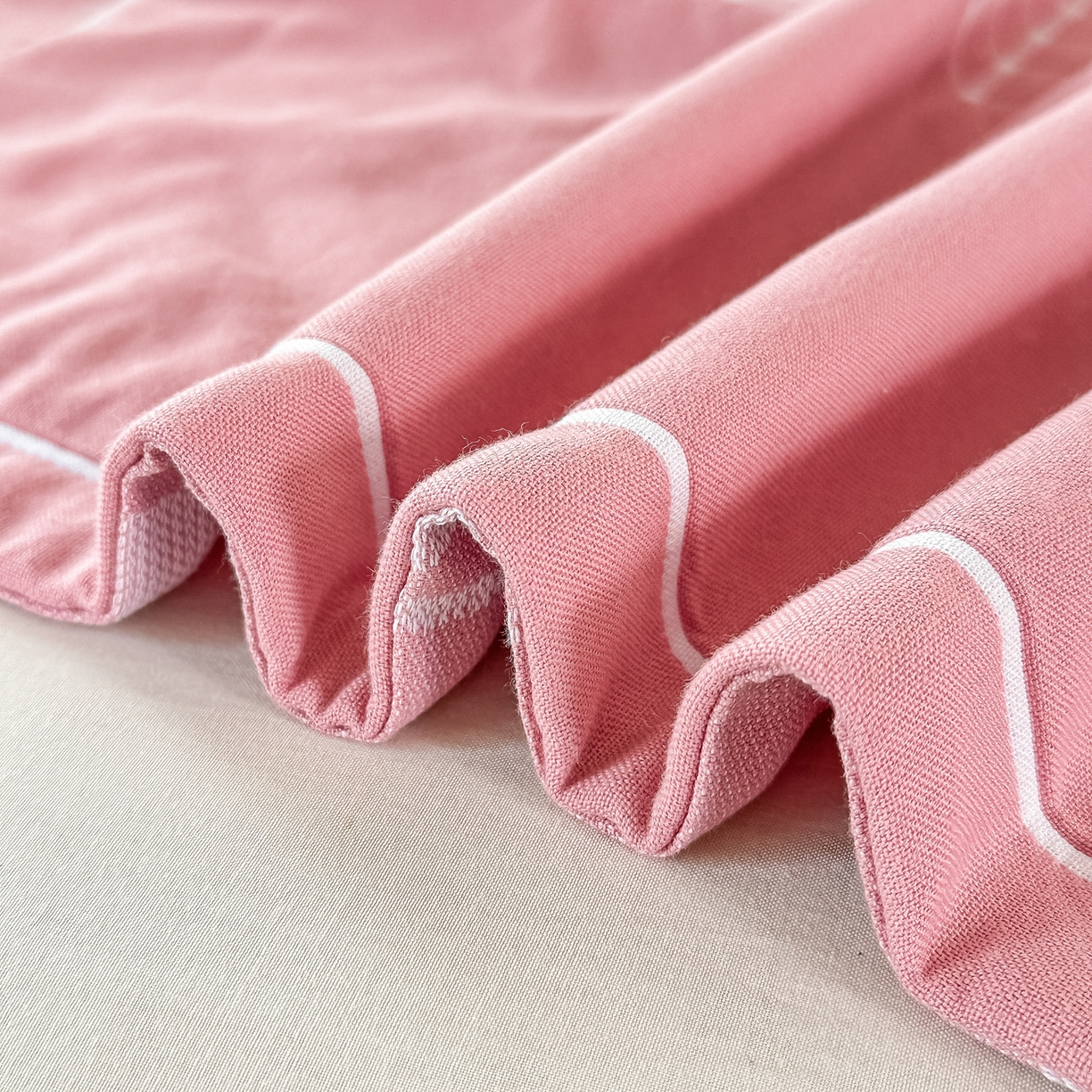 91家纺网 家纺一手货源 找家纺 沐瑟家纺 2025新款怡家枕套单品枕套枕套单件 笑脸-浅粉色