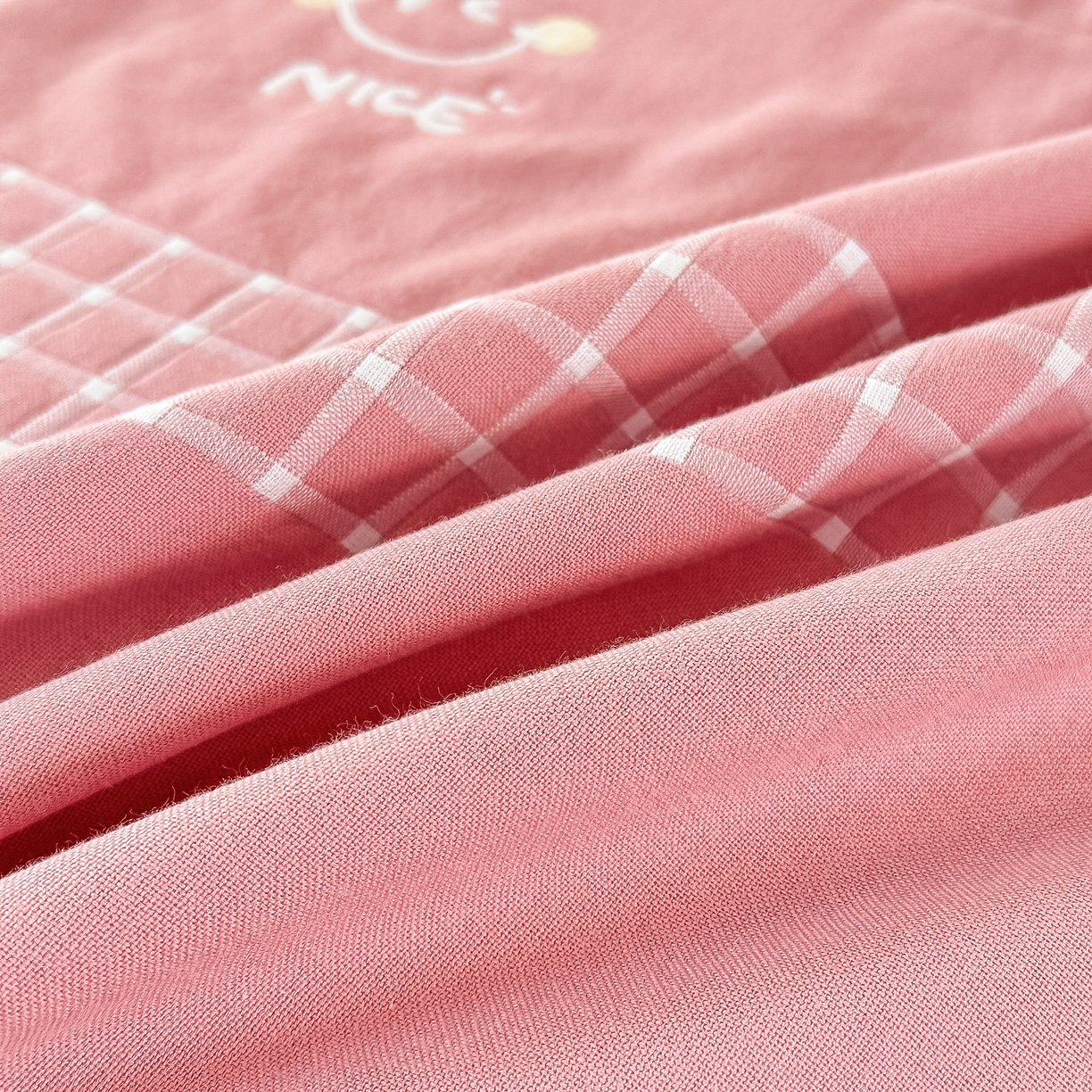 91家纺网 家纺一手货源 找家纺 沐瑟家纺 2025新款怡家枕套单品枕套枕套单件 笑脸-浅粉色