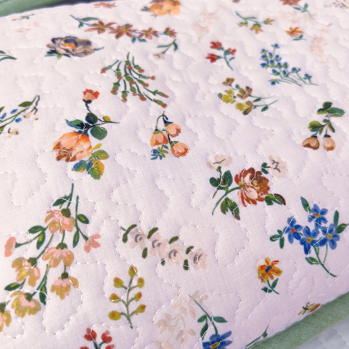 91家纺网 家纺一手货源 找家纺 拾小柒 2025年新款全棉双层纱枕套夹棉隔脏污防口水头油枕头套 春色满园