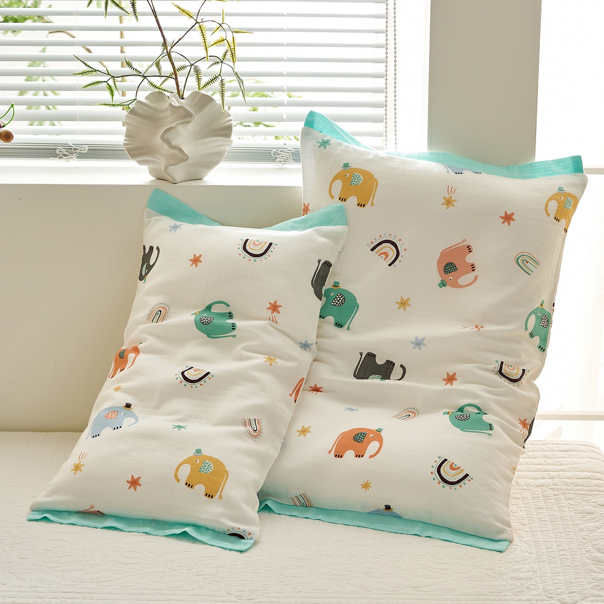 91家纺网 家纺一手货源 找家纺 乐可 2025新款双层纱宽边儿童枕套 TK3礼帽小象白