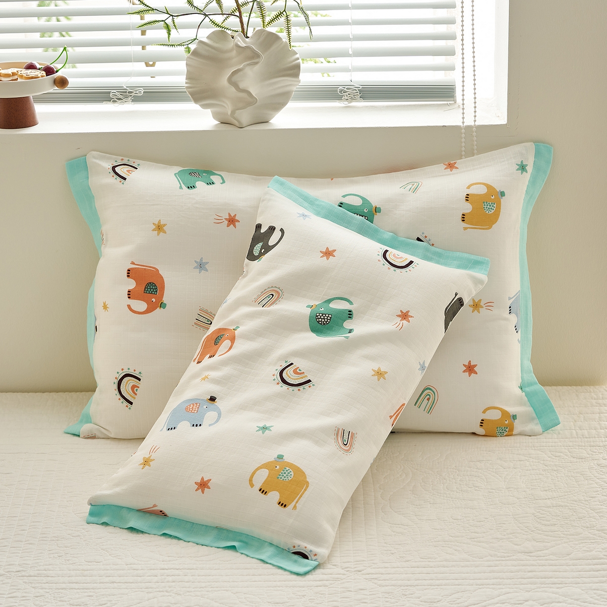 91家纺网 家纺一手货源 找家纺 乐可 2025新款双层纱宽边儿童枕套 TK3礼帽小象白