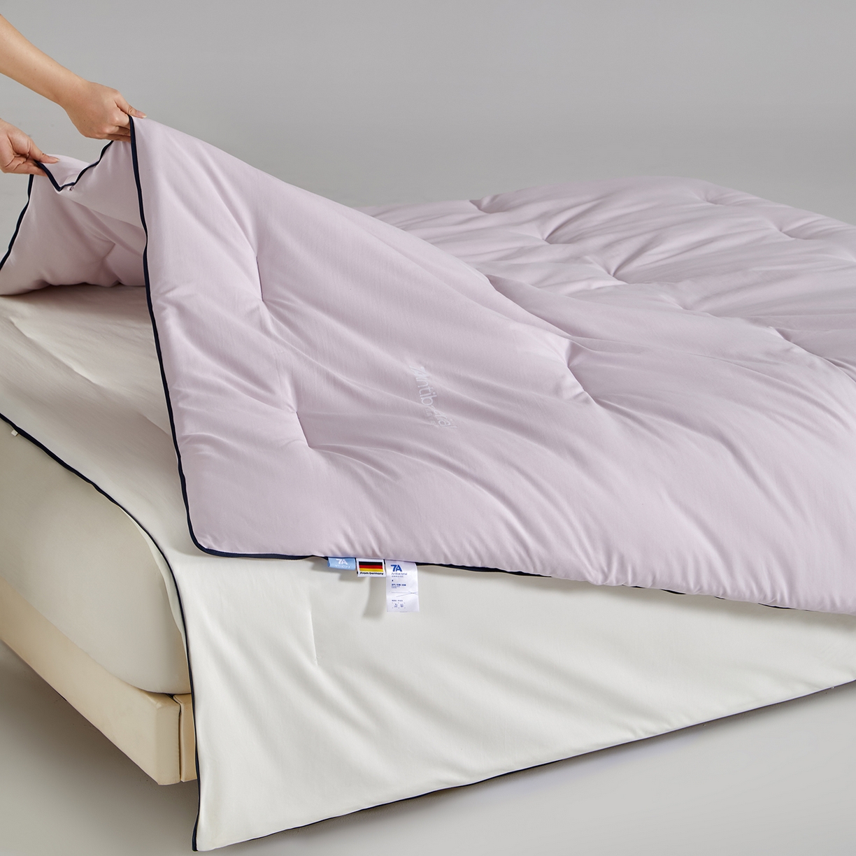 91家纺网 家纺一手货源 找家纺 玛德琳 2025新款7A吸湿发热抗菌子母被被子被芯 樱雾粉