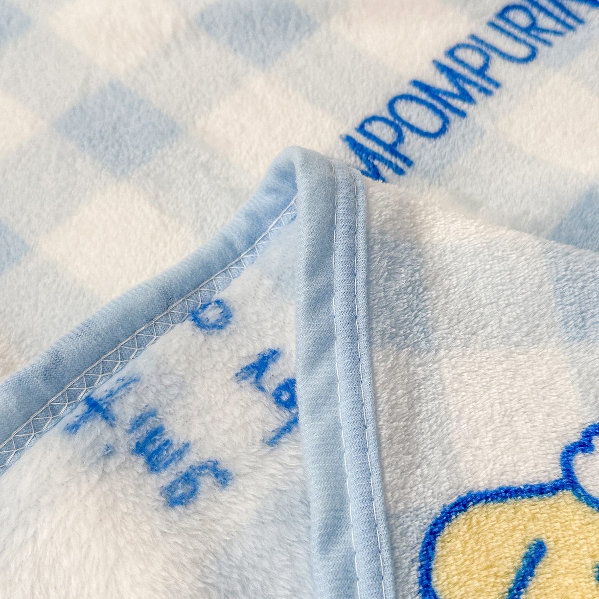 91家纺网 家纺一手货源 找家纺 花满路 2025新款亲肤舒适卡通系列毛毯 蓝格布丁狗