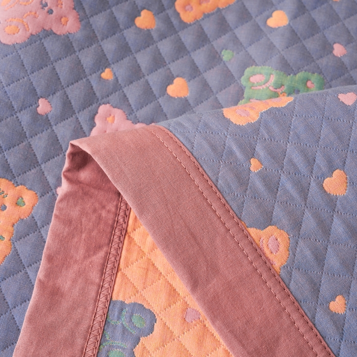 91家纺网 家纺一手货源 找家纺 棠薇家纺 2025新款全棉枕巾夹棉枕巾枕头盖巾彩纱三层纱枕巾 糖豆熊枕巾