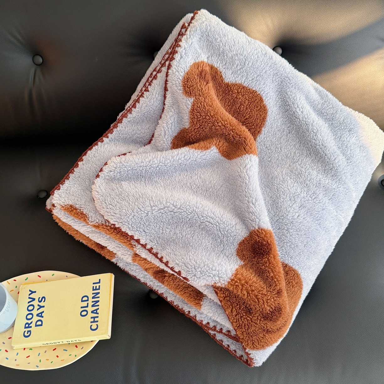 91家纺网 家纺一手货源 找家纺 顾里家纺 2025新款韩系卡通云朵绒盖毯 表情小熊